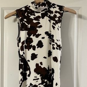 Cow print sleeveless top from the buckle